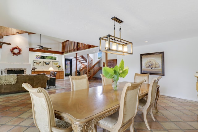 dining space featuring tile patterned floors and ceiling fan