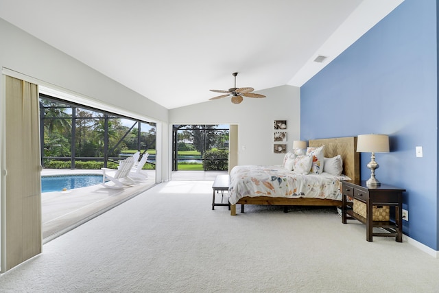 carpeted bedroom with access to outside, vaulted ceiling, and ceiling fan