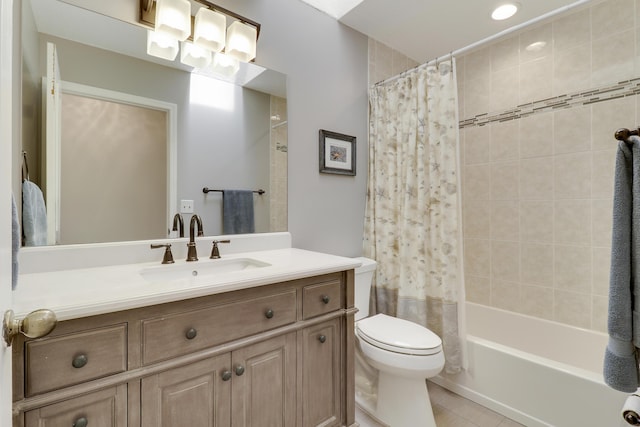 full bathroom with shower / bath combination with curtain, vanity, and toilet