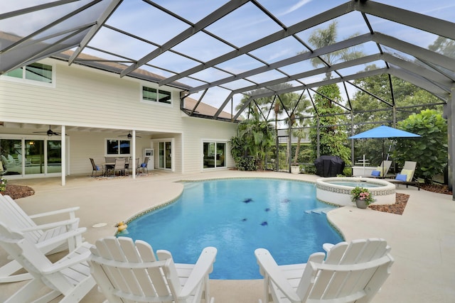 view of swimming pool with ceiling fan, a patio, outdoor dining area, a lanai, and a pool with connected hot tub