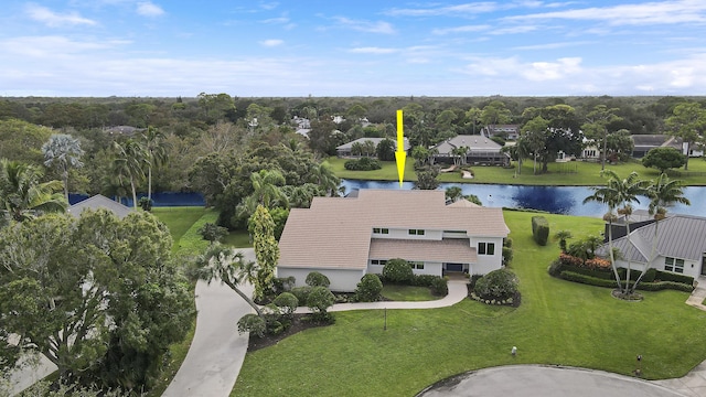 birds eye view of property featuring a water view