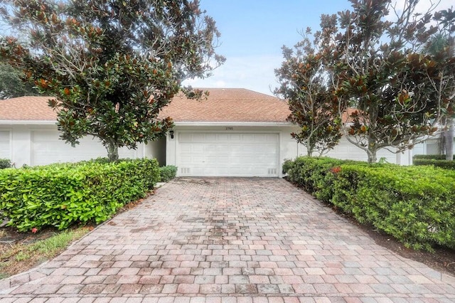 view of front of property featuring a garage