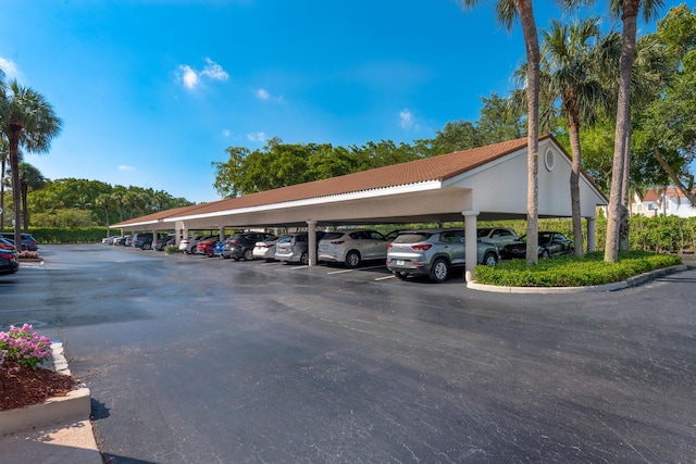 view of car parking with a carport