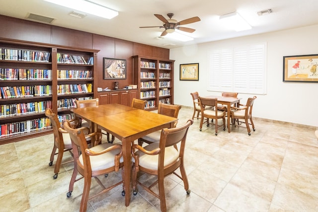 dining space with ceiling fan