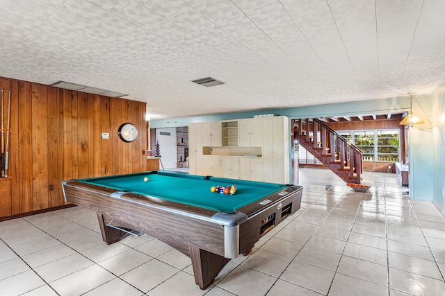 game room with billiards, wood walls, and light tile patterned flooring