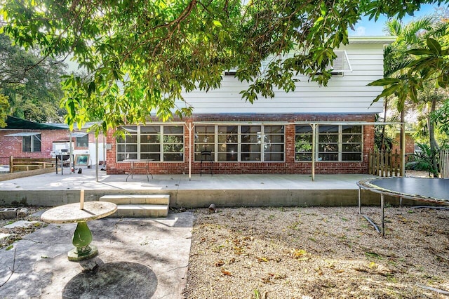 rear view of house featuring a patio area