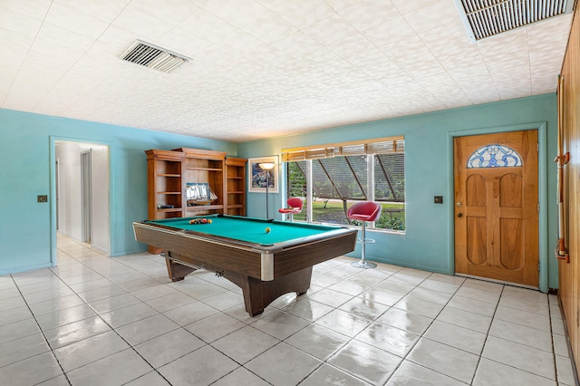 game room featuring pool table and light tile patterned floors