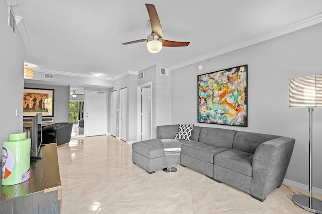 living room with ceiling fan and ornamental molding