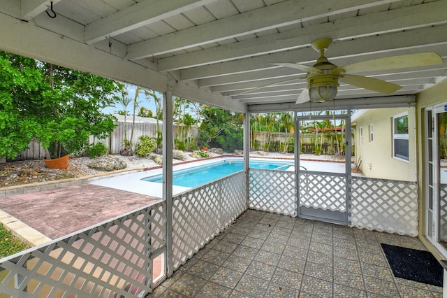 view of pool featuring ceiling fan and a patio area