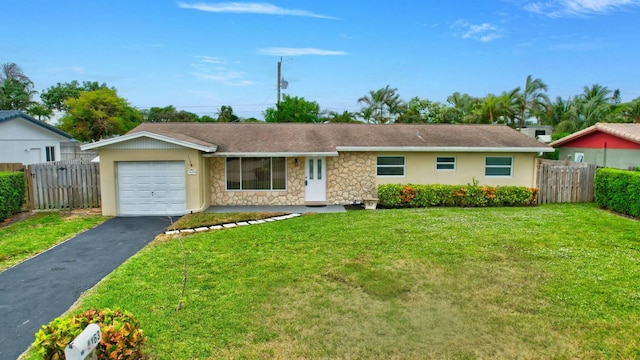 ranch-style house with a front lawn and a garage