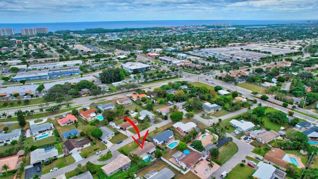 drone / aerial view featuring a water view