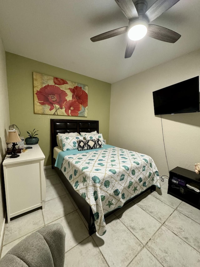 bedroom featuring tile patterned flooring and ceiling fan