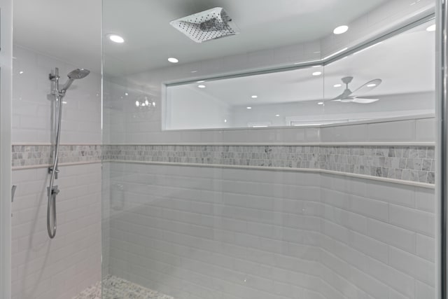 bathroom featuring a tile shower