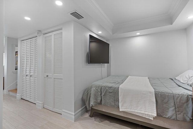 bedroom featuring crown molding