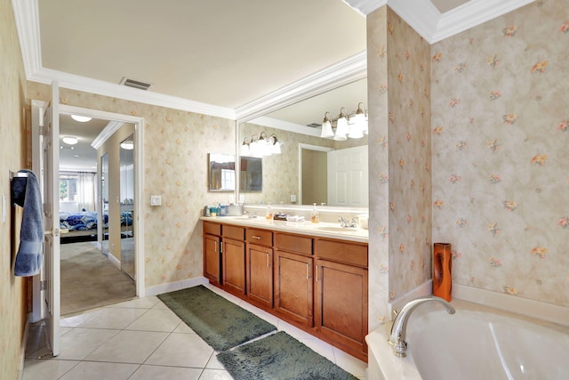 bathroom featuring vanity, ornamental molding, tile patterned floors, and a bath