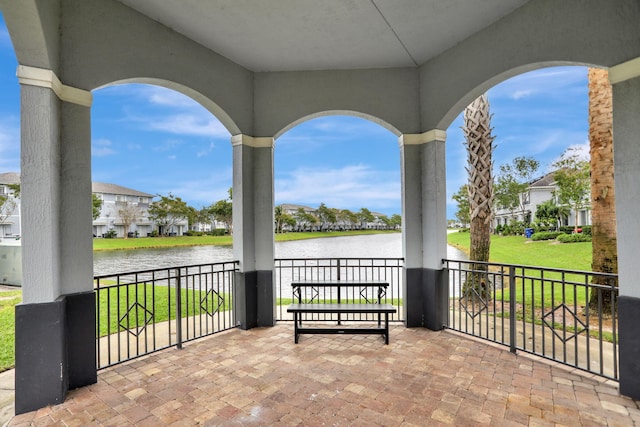 view of patio / terrace with a water view