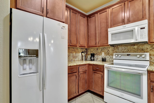 kitchen with backsplash, light stone counters, white appliances, and light tile patterned floors