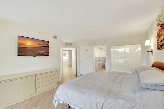 bedroom featuring light hardwood / wood-style floors