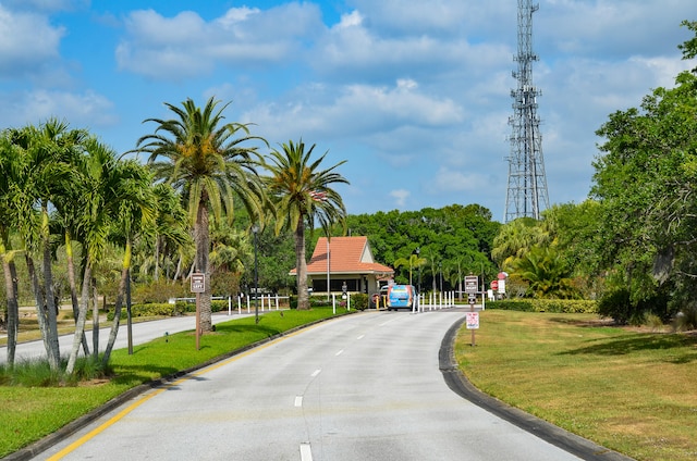 view of home's community featuring a lawn