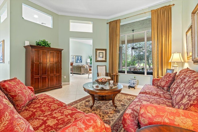 living room with ornamental molding and light tile patterned floors