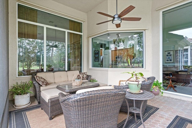 view of patio / terrace featuring ceiling fan and outdoor lounge area