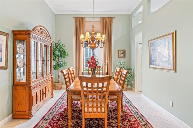 dining space featuring a healthy amount of sunlight, crown molding, and an inviting chandelier