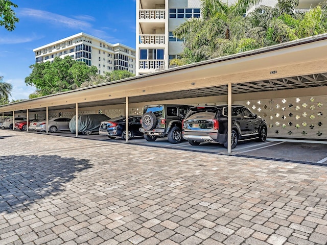 view of parking / parking lot with a carport