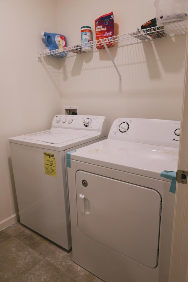 laundry room with washer and clothes dryer