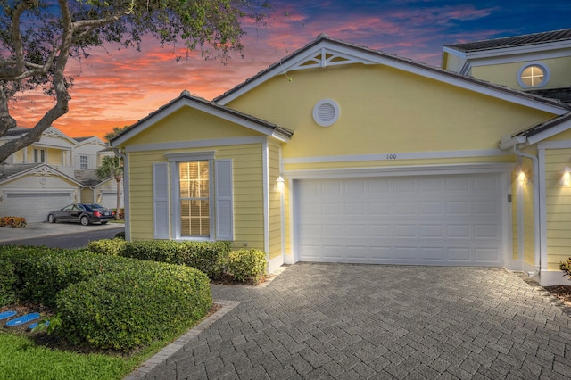 view of front of home with a garage