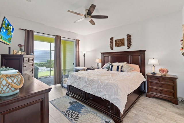 bedroom featuring ceiling fan, access to exterior, and light wood-type flooring