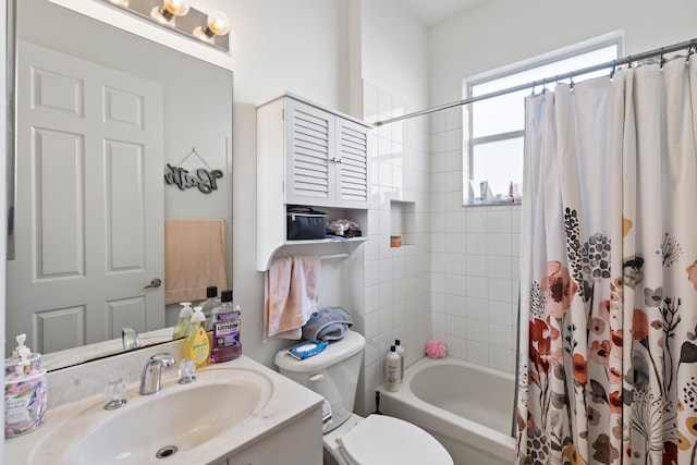 full bathroom with shower / bath combination with curtain, vanity, and toilet