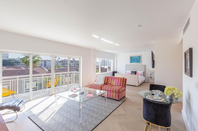 living room featuring light parquet flooring