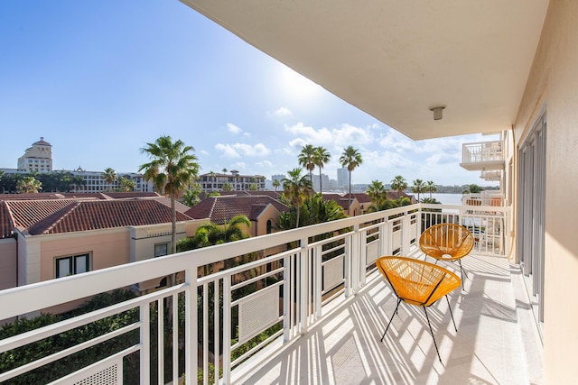 balcony featuring a water view