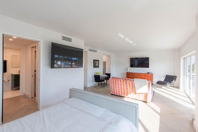 bedroom featuring light parquet flooring