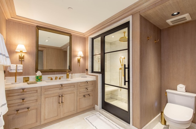 bathroom featuring toilet, ornamental molding, vanity, and walk in shower