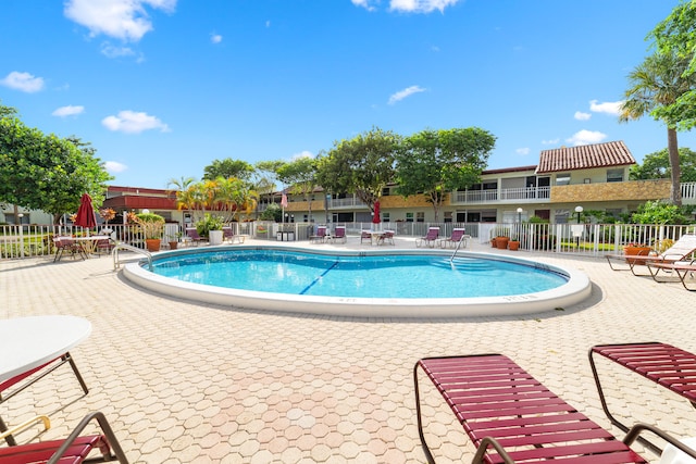 view of pool with a patio