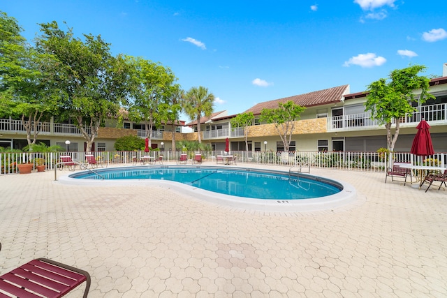 view of pool featuring a patio