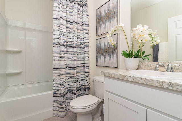 full bathroom with vanity, toilet, tile patterned floors, and shower / tub combo