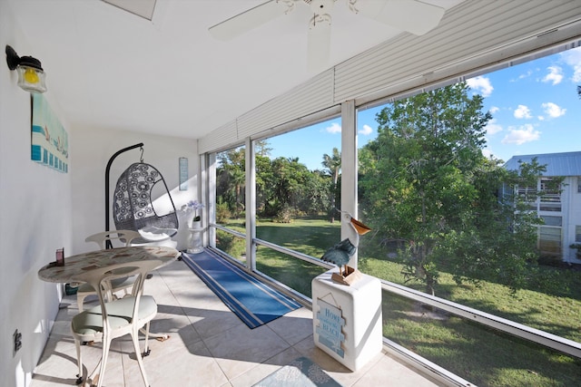 sunroom / solarium with ceiling fan