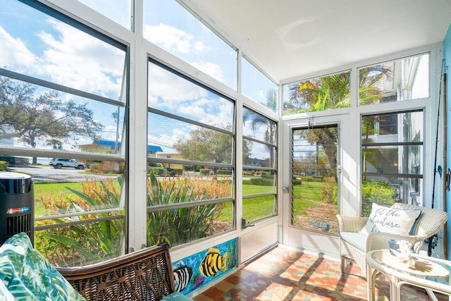 sunroom / solarium featuring plenty of natural light