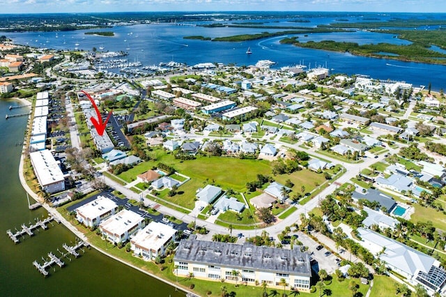 drone / aerial view with a water view