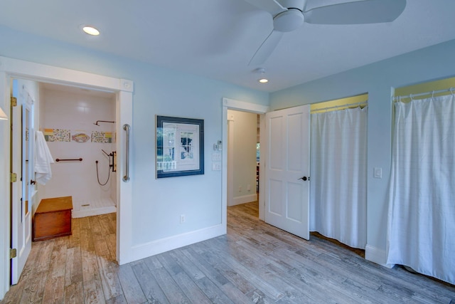 unfurnished bedroom featuring ceiling fan and light hardwood / wood-style flooring