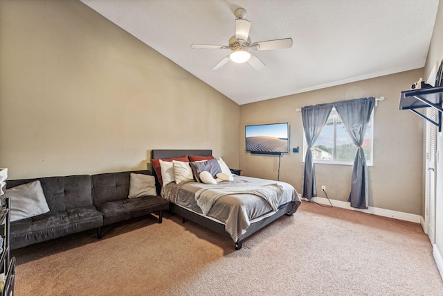 carpeted bedroom featuring vaulted ceiling and ceiling fan