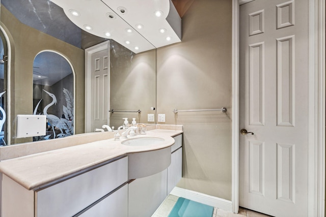 bathroom with vanity and tile patterned floors