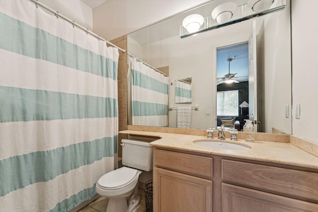 bathroom with toilet, ceiling fan, tile patterned floors, a shower with curtain, and vanity