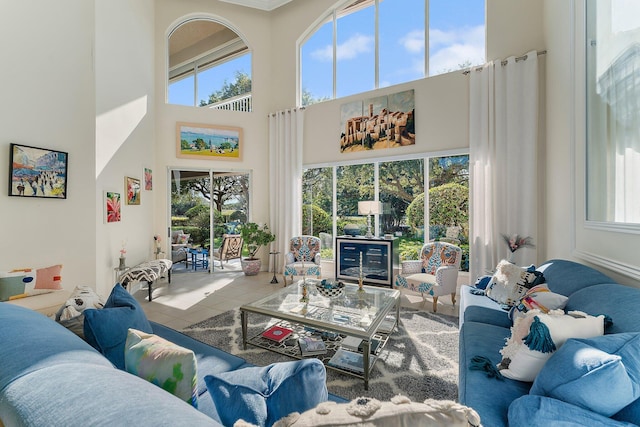 12020 SE Birkdale Run, Jupiter, FL 33469 - living area featuring a high ceiling and tile patterned floors