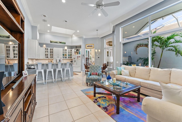 12020 SE Birkdale Run, Jupiter, FL 33469 - living area featuring light tile patterned floors, crown molding, a ceiling fan, and recessed lighting