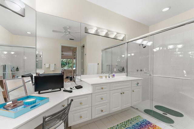 bathroom with vanity, tile patterned floors, a shower with shower door, and ceiling fan