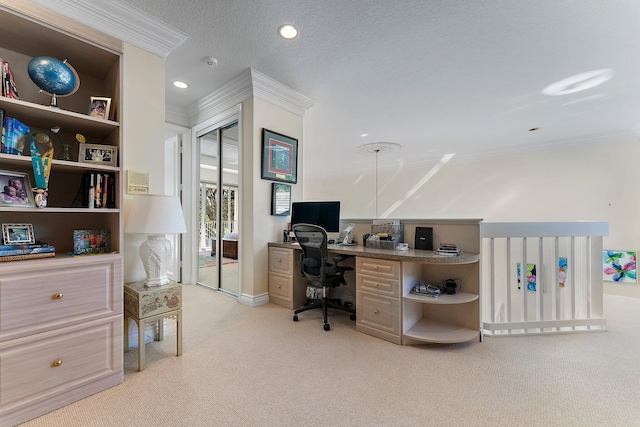 office featuring ornamental molding, a textured ceiling, and light colored carpet