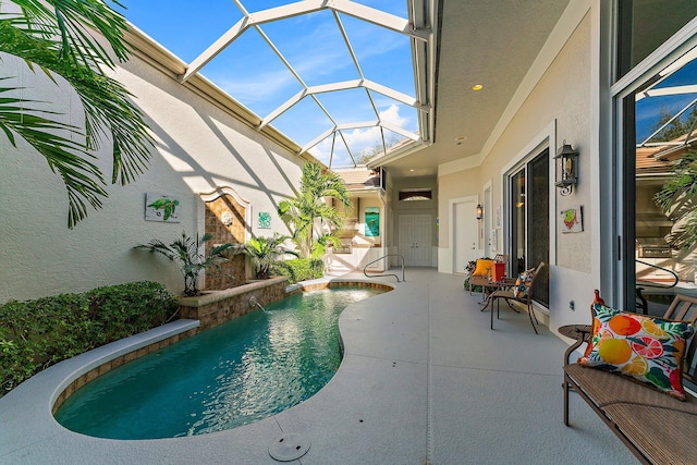 view of swimming pool featuring a patio and glass enclosure